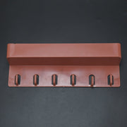 Angled view of the multi-use Key Holder Stand displaying its sleek design and ample space for organization.