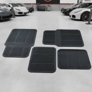 Universal vehicle floor protection mats in black rubber