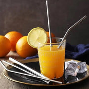 Reusable stainless steel straws neatly stored in their compact travel case.