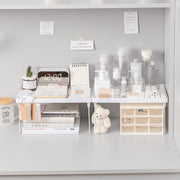 Space-saving bathroom and kitchen shelf with foldable legs