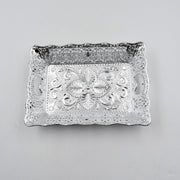 Decorative mukhwas serving tray beautifully arranged on a modern dining table.