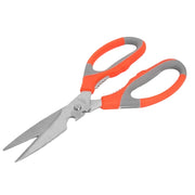 Stainless steel kitchen scissors cutting a piece of meat, demonstrating their strong grip and sharp edge.