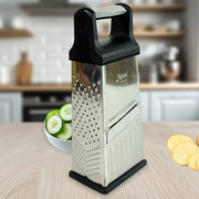 Apex 5-in-1 stainless steel slicer and grater in use grating vegetables