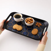 Close view of plastic serving trays with ergonomic side handles