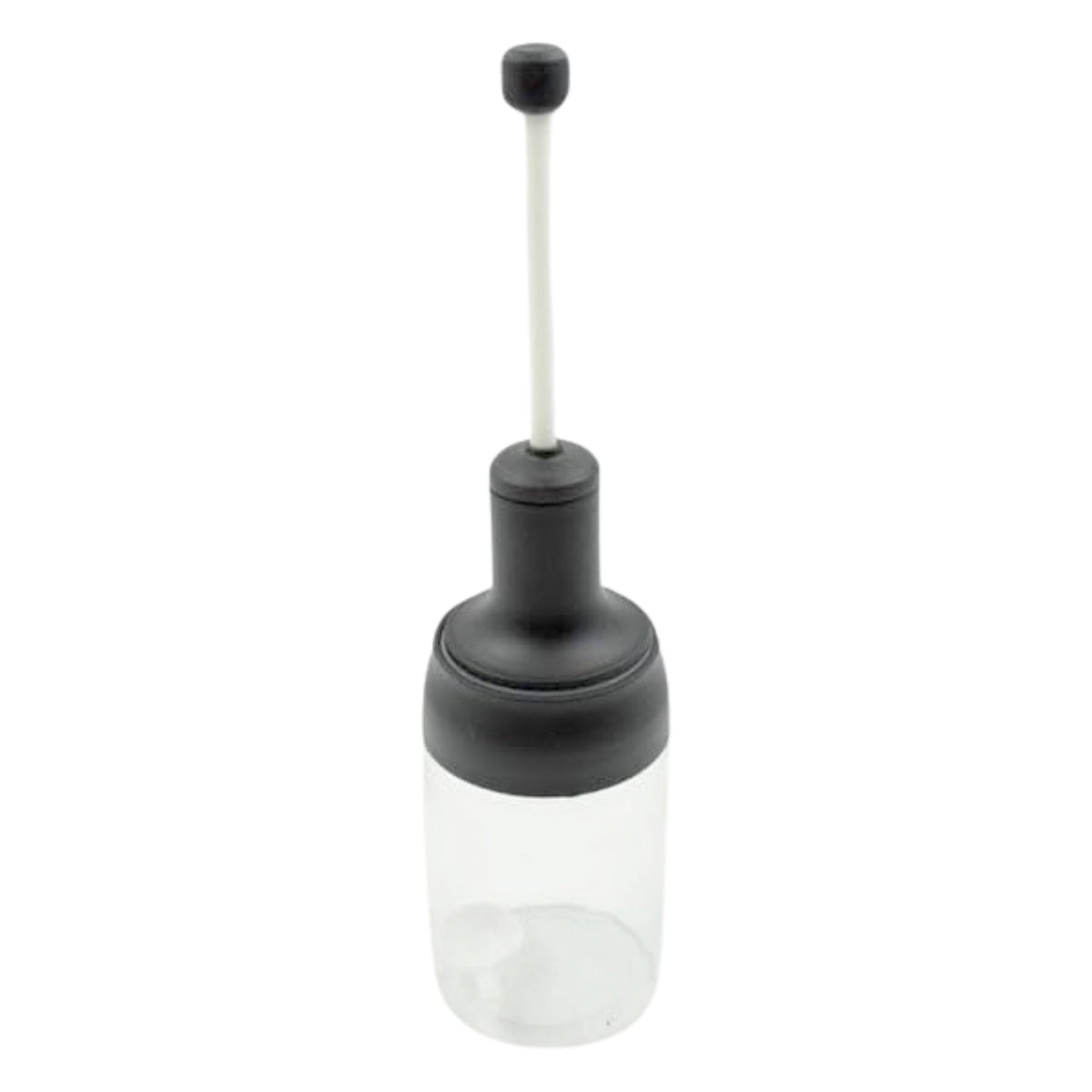 The sleek design of the Heat-Resistant Glass Seasoning Jar on a kitchen counter.