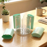 Top view of compact rotating pen holder with central pen cup
