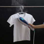 Portable Garment Steamer in use, quickly removing wrinkles from clothing.