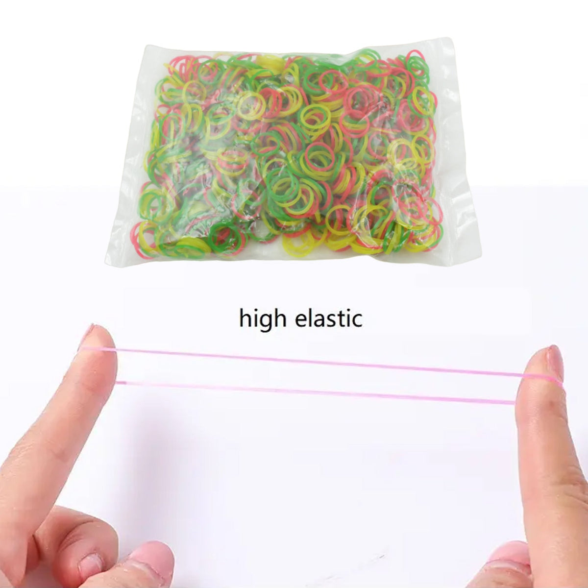 Durable multicolor rubber bands securing various items on a desk.