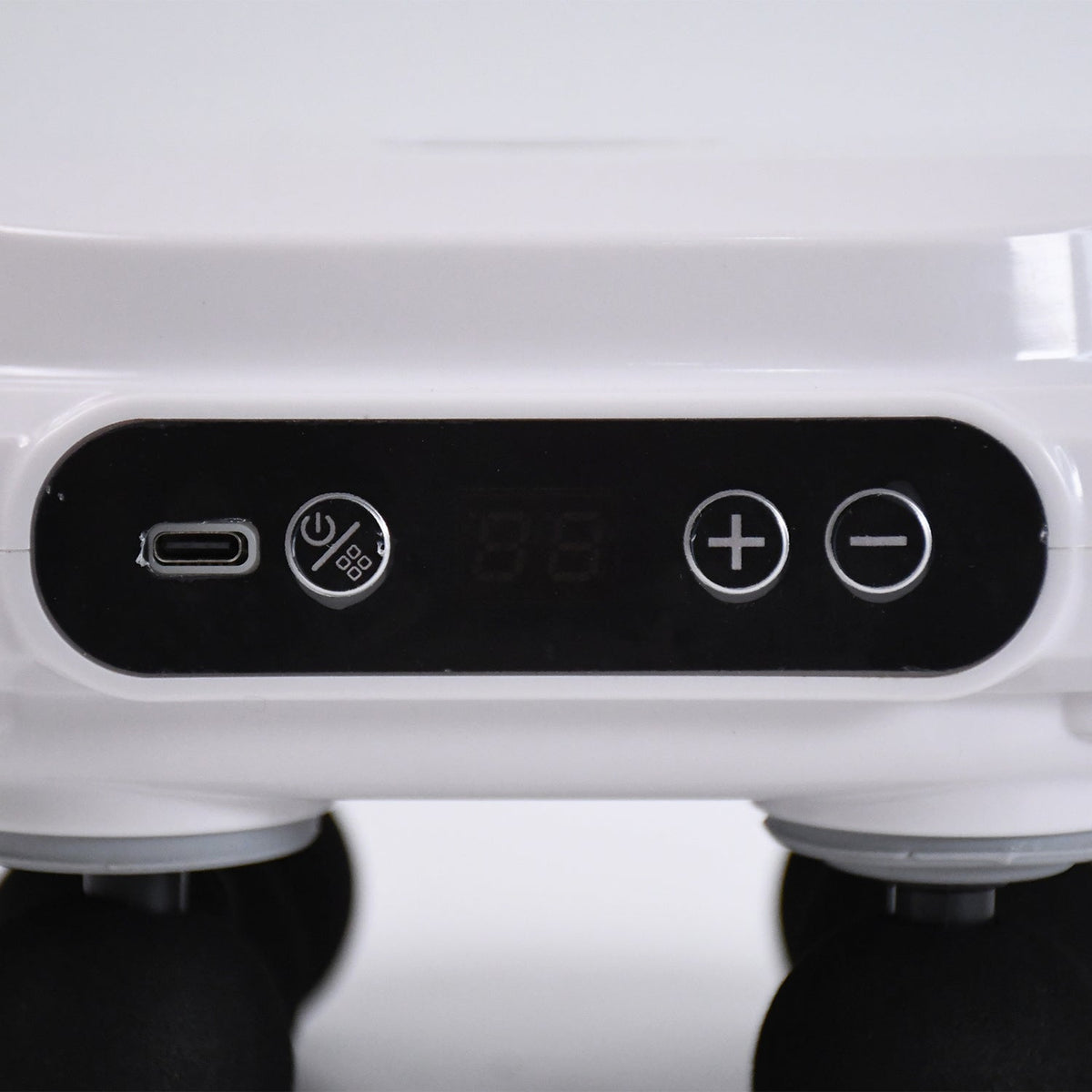 Powerful percussion massage gun designed to target sore muscle knots and tension