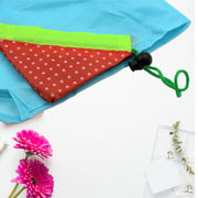 A collection of sturdy reusable shopping bags with handles, ideal for carrying groceries.