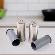Modern style stainless steel salt and pepper shaker set in kitchen