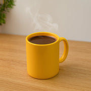 Elegant plastic mug and spoon set ideal for tea and coffee lovers