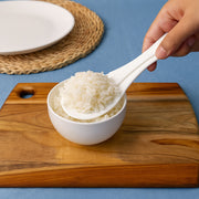 Wide flat non-stick spoon designed for serving sticky rice