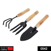 Overhead view of the durable 3-piece hand gardening tools set with ergonomic handles.