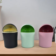Compact tabletop trash can with durable swing lid design