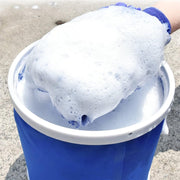Plush microfiber hand glove duster for scratch-free cleaning.