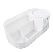 Makeup storage caddy featuring dual-layer drawers and rotating top tray