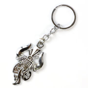 Keychain showcasing spiritual Trishul and Damru symbols with silver finish