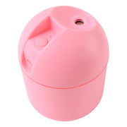 USB powered humidifier glowing with a soft, color-changing LED light.