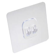Self-adhesive wall hook holding a towel neatly in a modern bathroom.