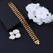 Golden Rudraksha Bracelet displayed in a spiritual Rakhi style, suitable as a thoughtful gift.