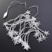 Festive USB powered star string LED lights creating warm ambiance