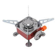Close-up of the Mini Camping Stove's gas burner and control knob, showing its precise flame adjustment.