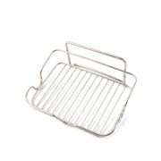 Elevated stainless steel soap stand holding bathroom essentials securely