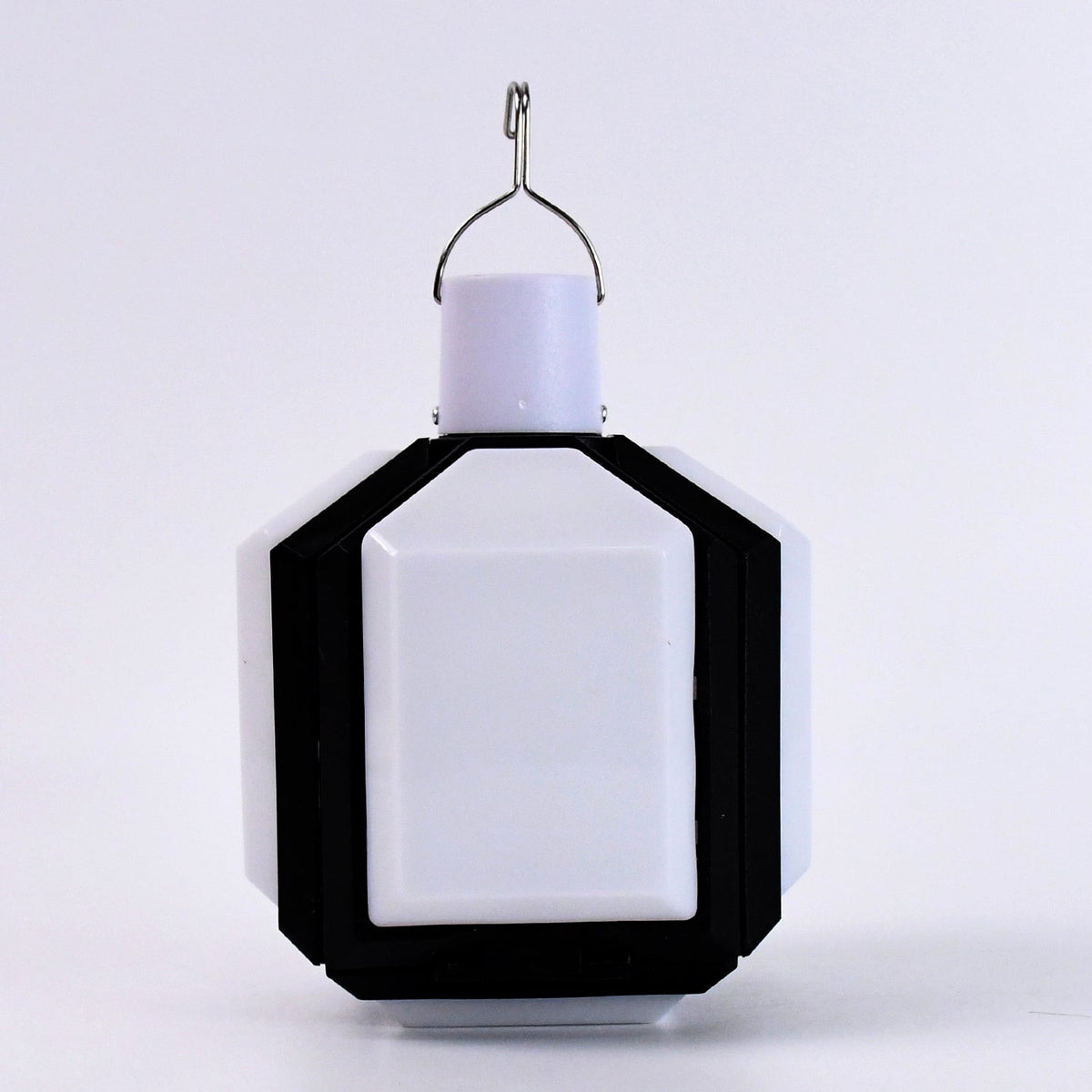 Portable camping LED light shown folded for easy travel and storage