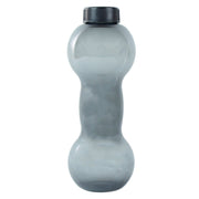 The FitFuzion dumbbell water bottle on a table, ready for your next gym session or daily hydration.