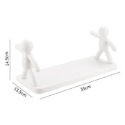 A single floating wall shelf used as a functional display area for small home accents.