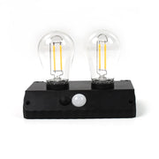 Two bright LED bulbs of the Indo Glow solar lamp clearly visible.