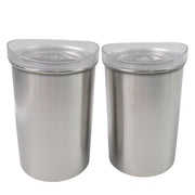 Close-up of the transparent lid and brushed finish of a Konvex steel container, highlighting quality.