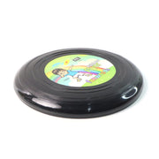 Close up of small outdoor flying disc used for park catch game