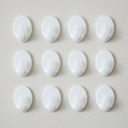 Close up of a strong self adhesive hook showing compact design