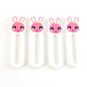 Pull handles mounted on cabinet doors using self stick push pull helper set