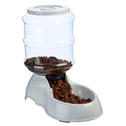 Close-up of the automatic pet food dispenser, highlighting its sturdy base and transparent bottle