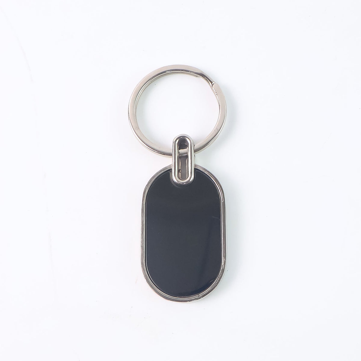 Monogram edge silver and black oval metal key holder accessory
