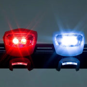 Easy install bike lights attached securely to a bicycle frame and seat post, ready for use.