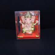 Medium Lord Ganesh Idol with softly glowing solar base amidst peaceful decor