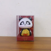 Multiple solar panda figurines in various poses, emphasizing their charm as car interior accessories.