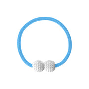 Detailed view of braided polyester rope and strong magnet on curtain tieback