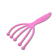 Side profile of the compact AuriGlam handheld scalp massager, highlighting its design.