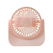 User enjoying cooling from silent mini desktop fan at workspace