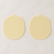 Silicone leaf coaster protecting surface from heat and moisture with hot beverage