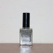 Bottle of Silver Moonlight Starlet Glitter Nail Paint with rich silver sparkle