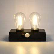 Indo Glow Solar Double LED Lamp providing ample light for an outdoor area.