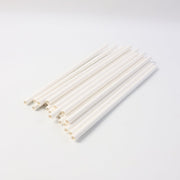 Eco-friendly paper straws displayed with green leaf, highlighting sustainable use