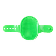 Pet cleaning brush featuring ergonomic grip and adjustable strap