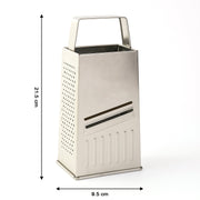Box-style stainless steel grater placed on kitchen counter for food preparation.